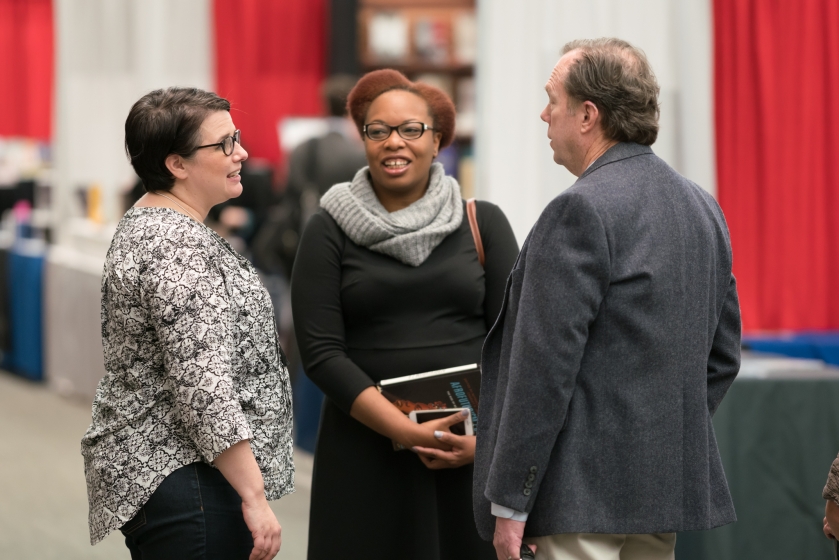 three people at the convention